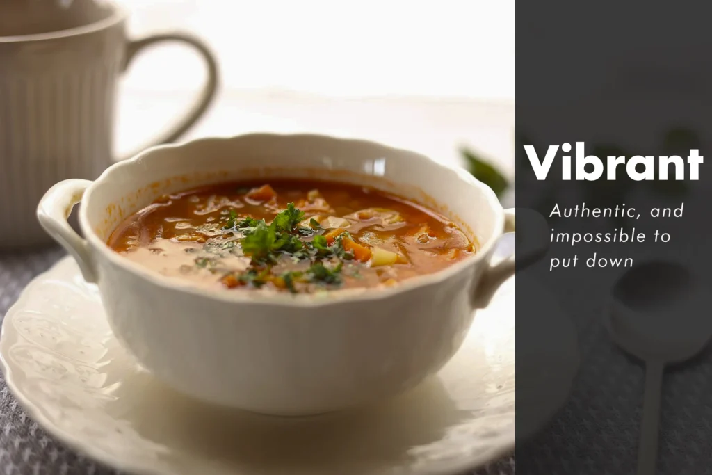 Colorful Italian Minestrone soup in a rustic bowl with ditalini pasta, kidney beans, zucchini, and fresh basil.