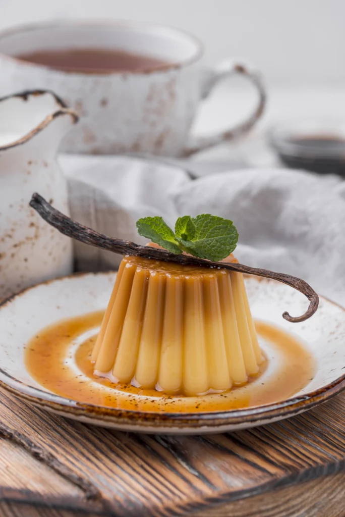 Warm sticky toffee pudding with melting vanilla ice cream and caramel sauce.