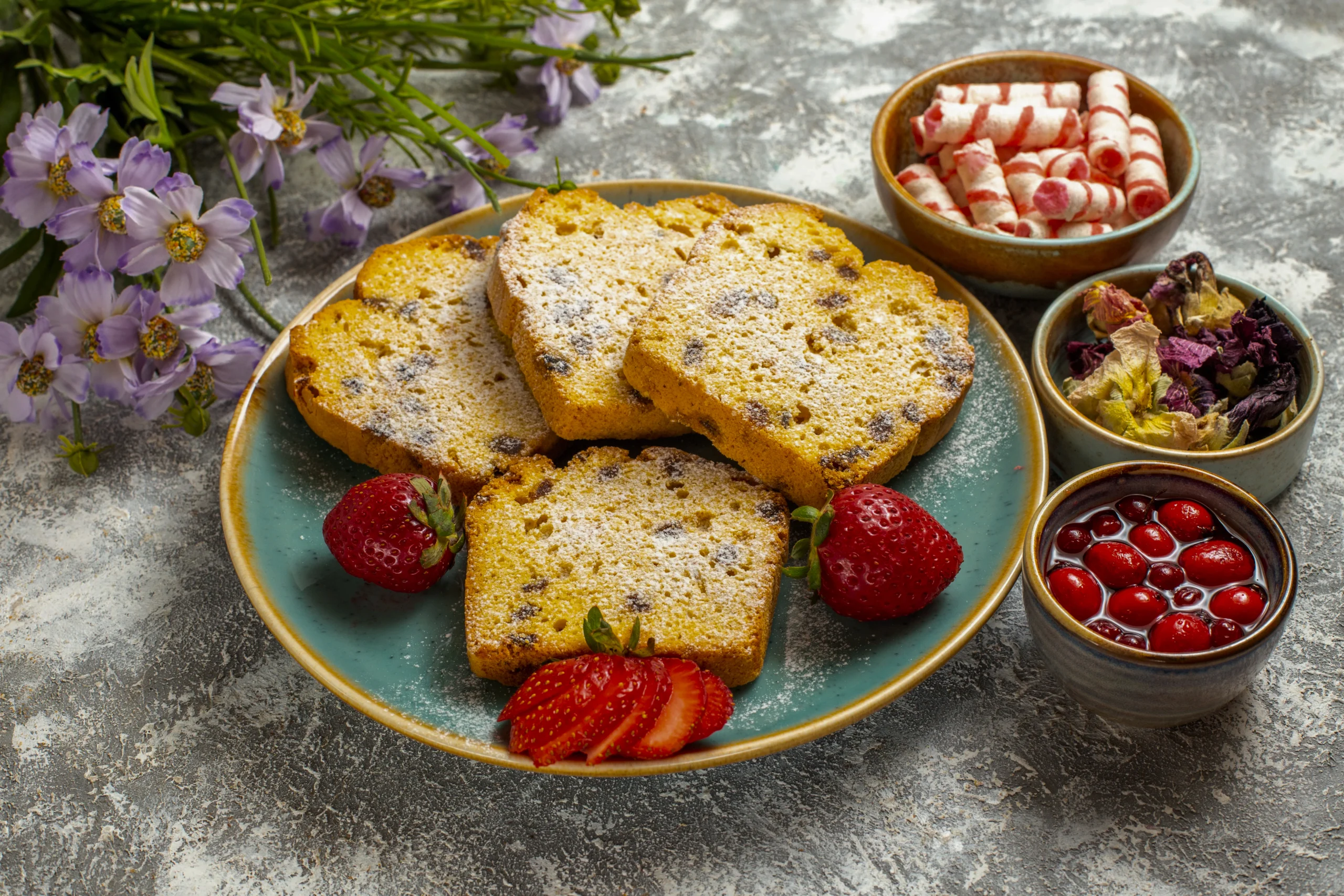 Close-up of a serving of warm bread pudding showing layers of buttered bread soaked in nutmeg-spiced custard.