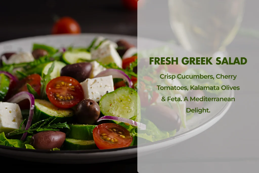 A top-down professional food photograph of a traditional Greek Salad. Vibrant red tomato wedges, sliced cucumbers, and red onions are topped with a large, whole block of white feta cheese, black Kalamata olives, and a heavy sprinkle of dried oregano, drizzled with glistening olive oil.