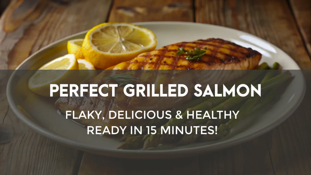 Flaky grilled salmon fillet with charred grill marks and a glossy lemon butter sauce.