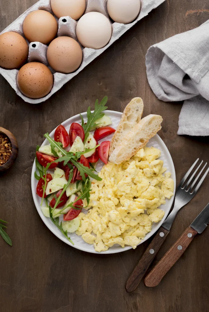 Soft and creamy scrambled eggs served on toasted sourdough bread with chives.