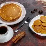 Simple 3-ingredient British pancake batter cooked into a flat, crêpe-like pancake in a non-stick frying pan