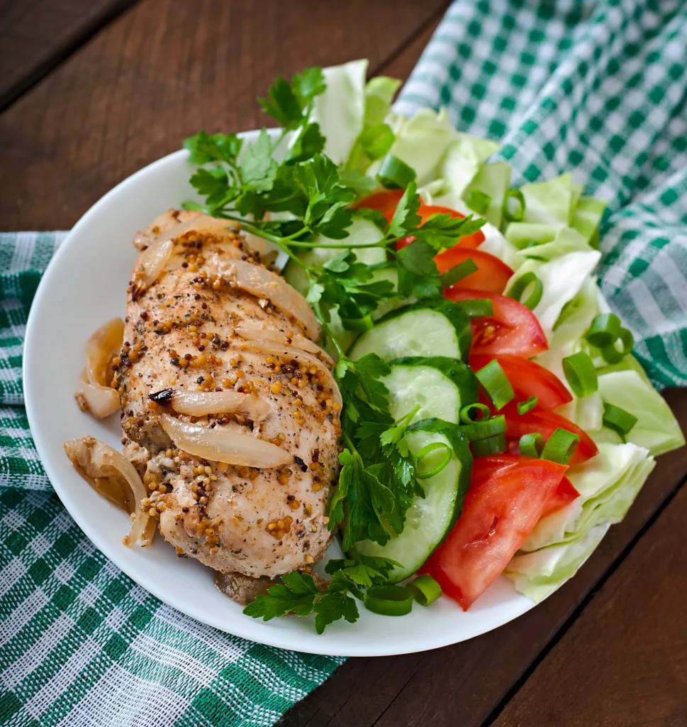 A 30-minute high-protein Grilled Chicken Quinoa Bowl, the perfect healthy lunch for meal prep, featuring herb-marinated chicken and fresh Mediterranean vegetables.