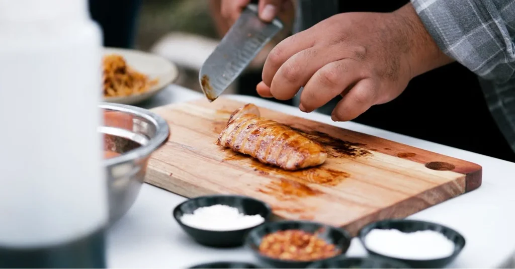image 14 Sliced juicy grilled chicken resting on a cutting board